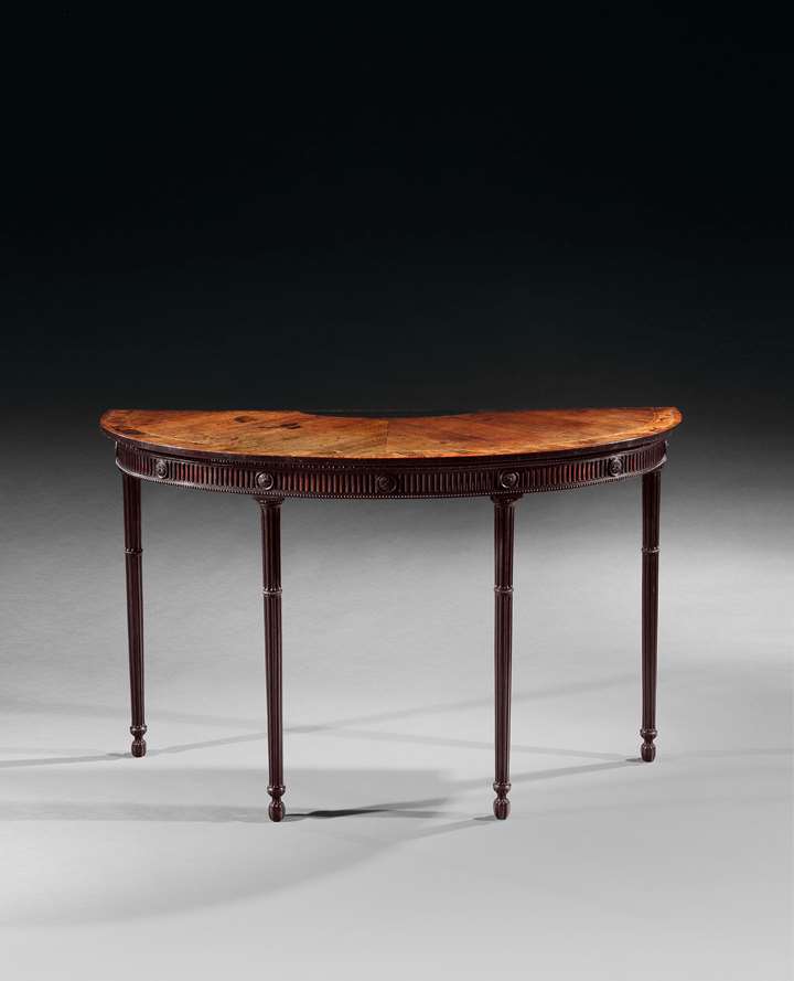 A fine semi elliptical mahogany side table